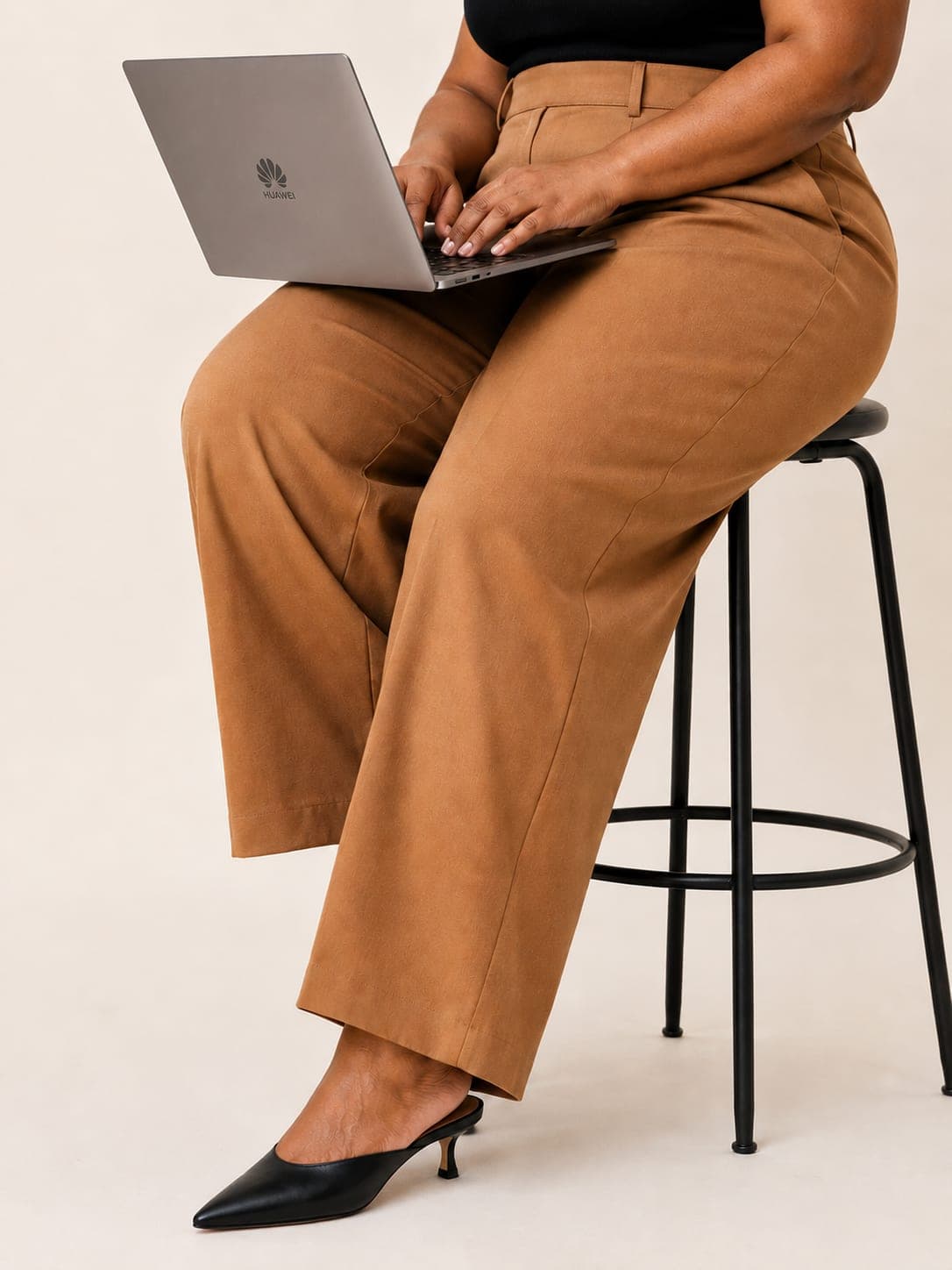 Close-up of Kagiso working on a laptop